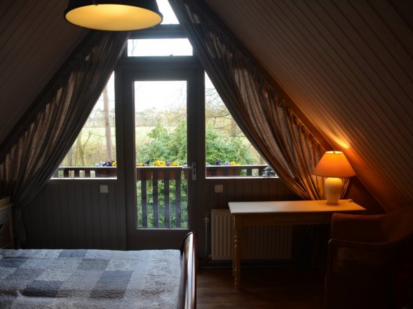 Schlafzimmer am ersten Stock, mit balkon